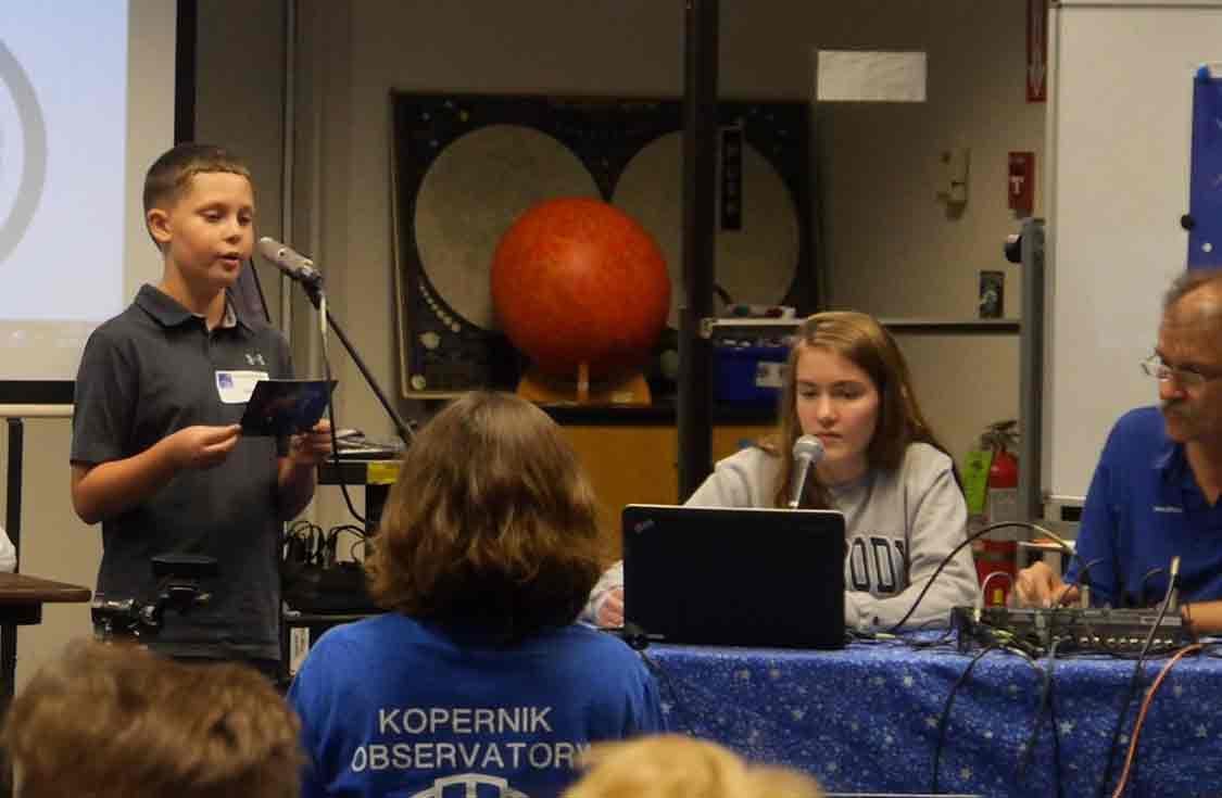 6th-grader Gage Taylor talks to an ISS astronaut using ham radio.